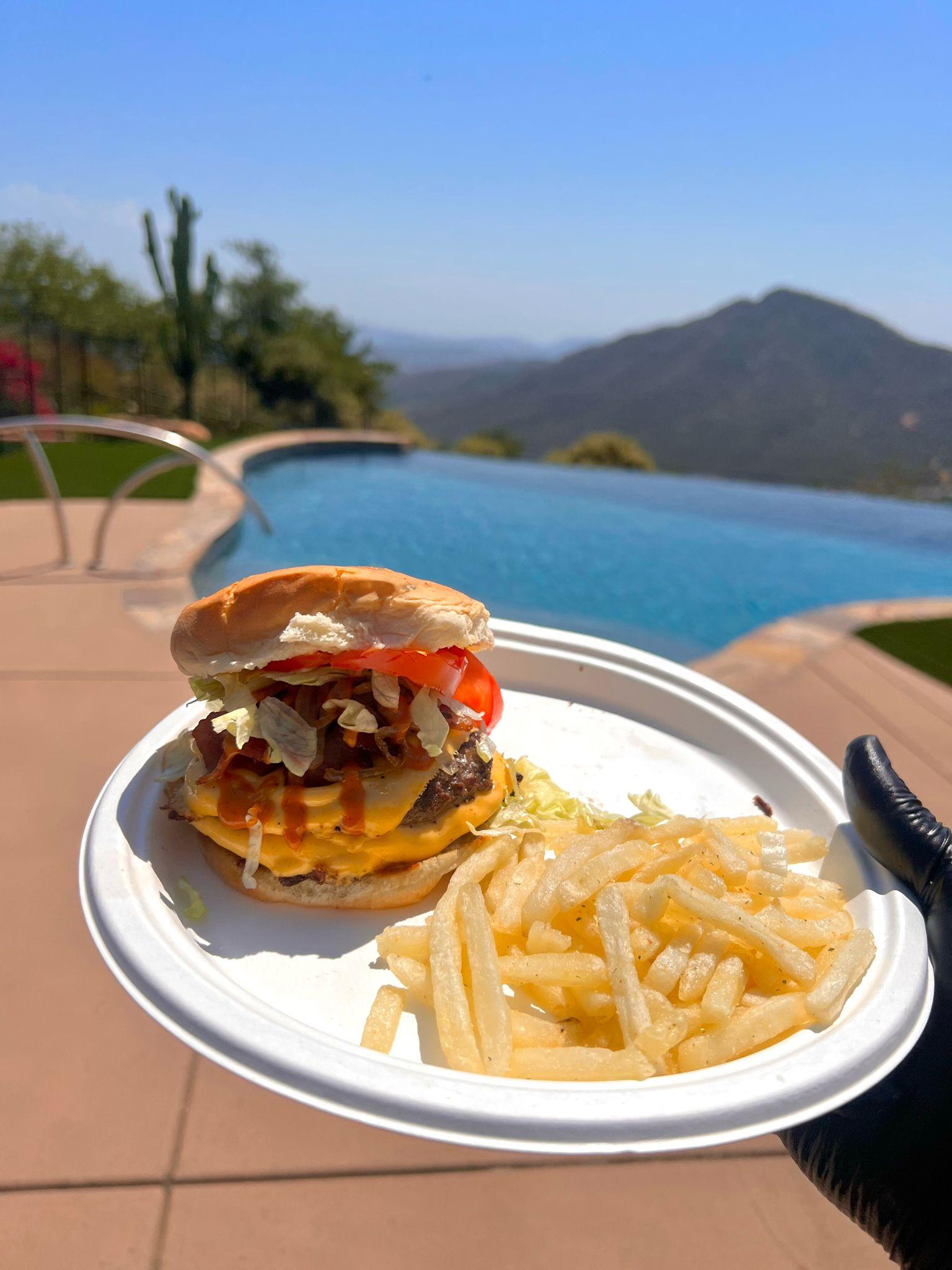 Freshly prepared burgers at a private event