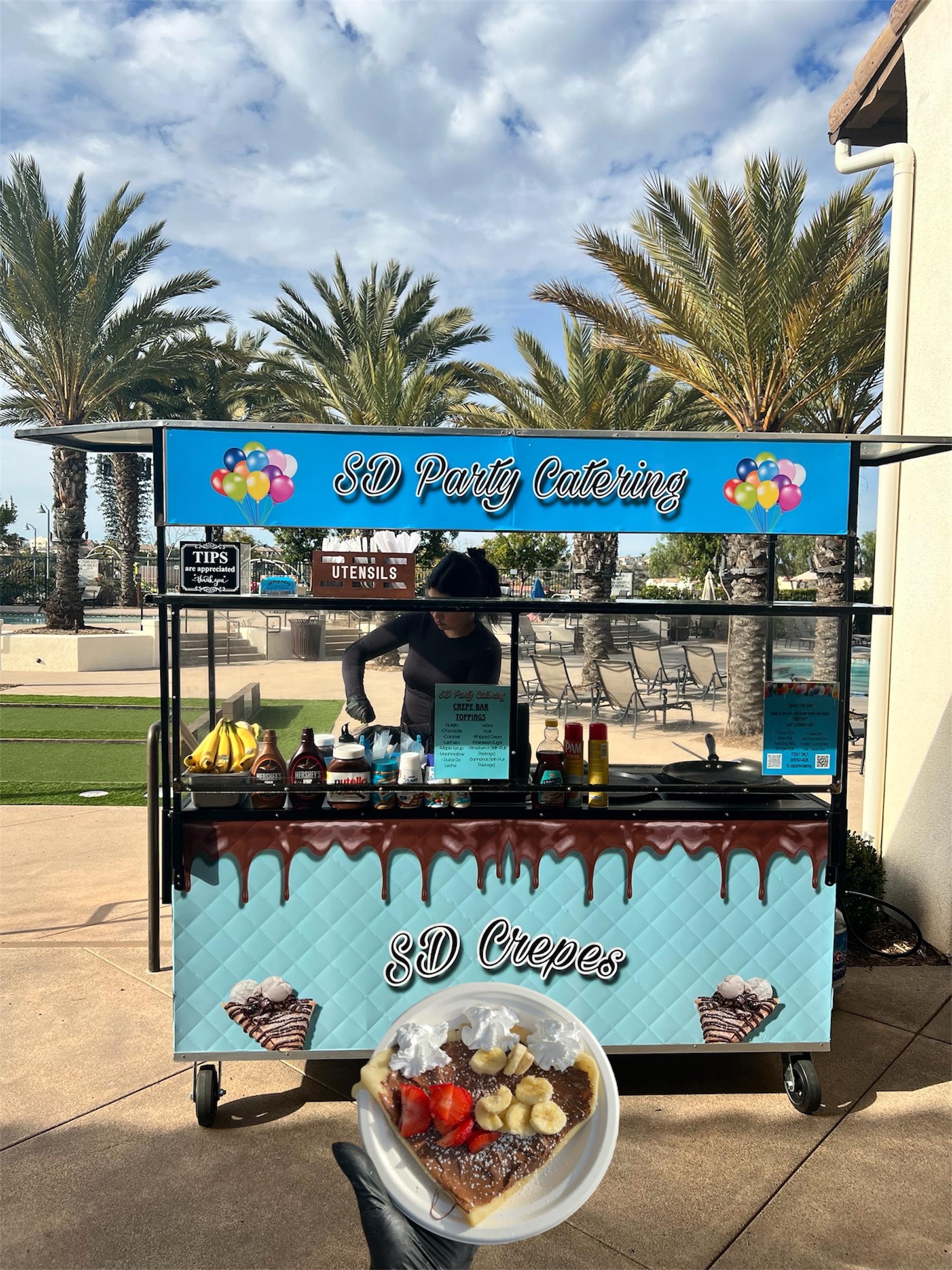 Crepe catering cart prepared for wedding guests